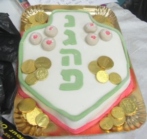 decorated Hanukkah cake, a great miracle happened here, Jerusalem photography tour