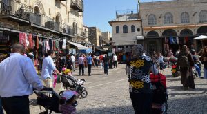 People walking near Jaffa Gate on Friday sukkot