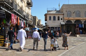 Muslim men going to pray in Old City Friday Sukkot