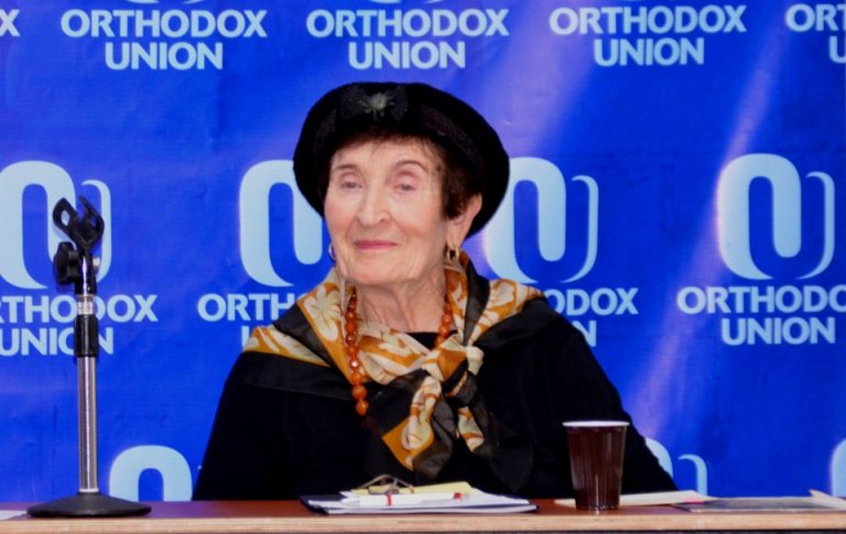 Miriam Litke speaking at OU Israel Center for Kristalnacht