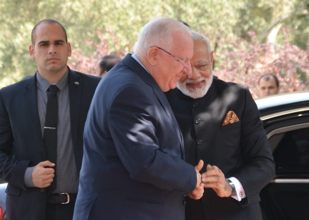 President Reuven Rivlin hugs PM Modi at Beit Hanasi