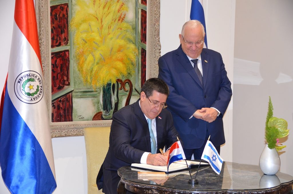  Horacio Cartes Paraguayan President signs official Israeli guest book at Beit Hanasi before opening of Paraguay Embassy in Jerusalem Israel 
