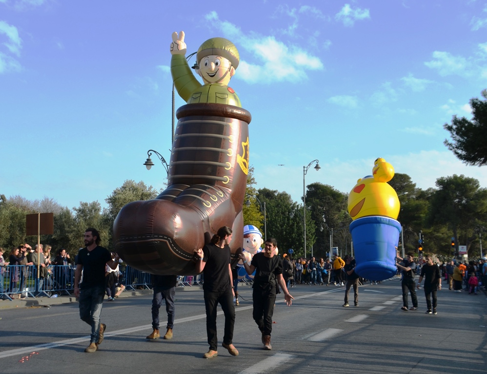 Jerusalem Hanukkah parade balloon of IDF soldier in paratrooper boot making a peace sign