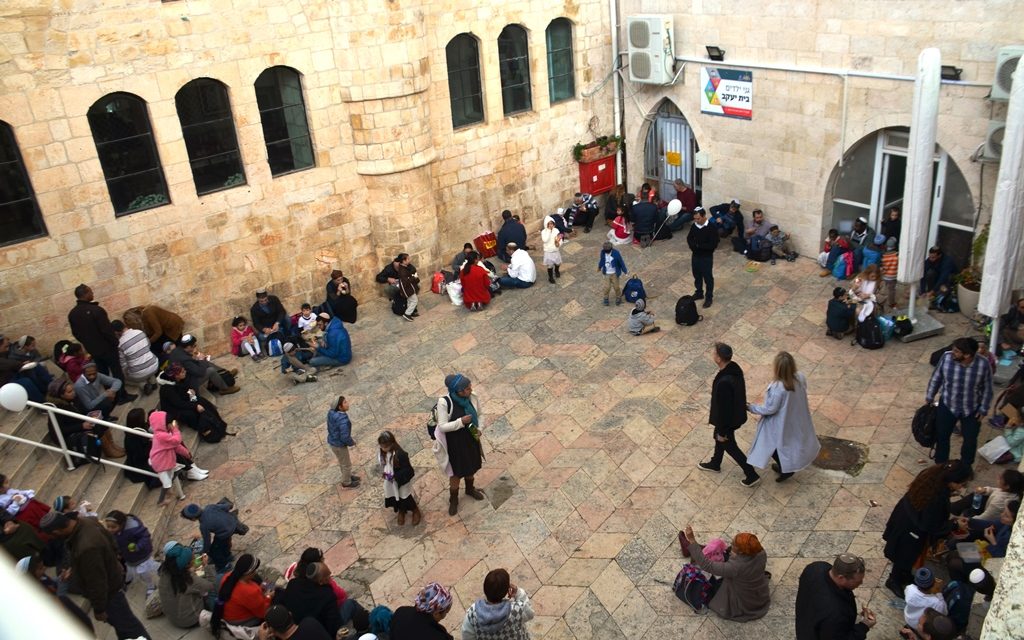 School children having lunch near 4 synagogues in Jerusalem Old City