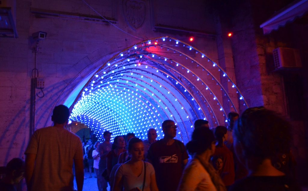 People taking photos at Jerusalem light festival