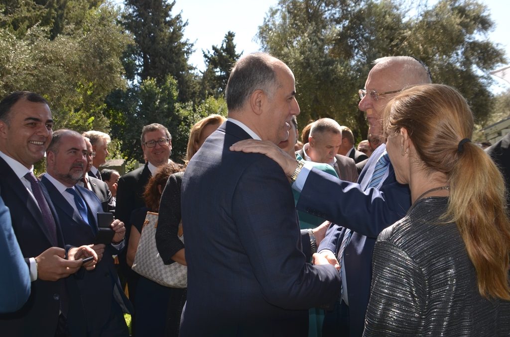 Ambassador from Jordan shaking hands with Israel President Rivlin in Jerusalem at Beit Hanasi gardens