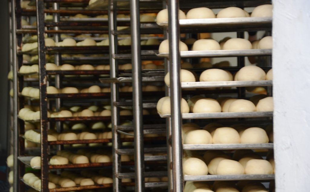 Hanukkah suffganiot rising in a bakery in Jeremiahs Israel 