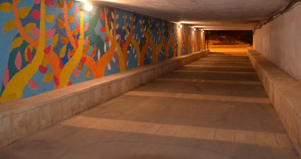 Jerusalem Israel Park pedestrian tunnel painted with colorful graffiti