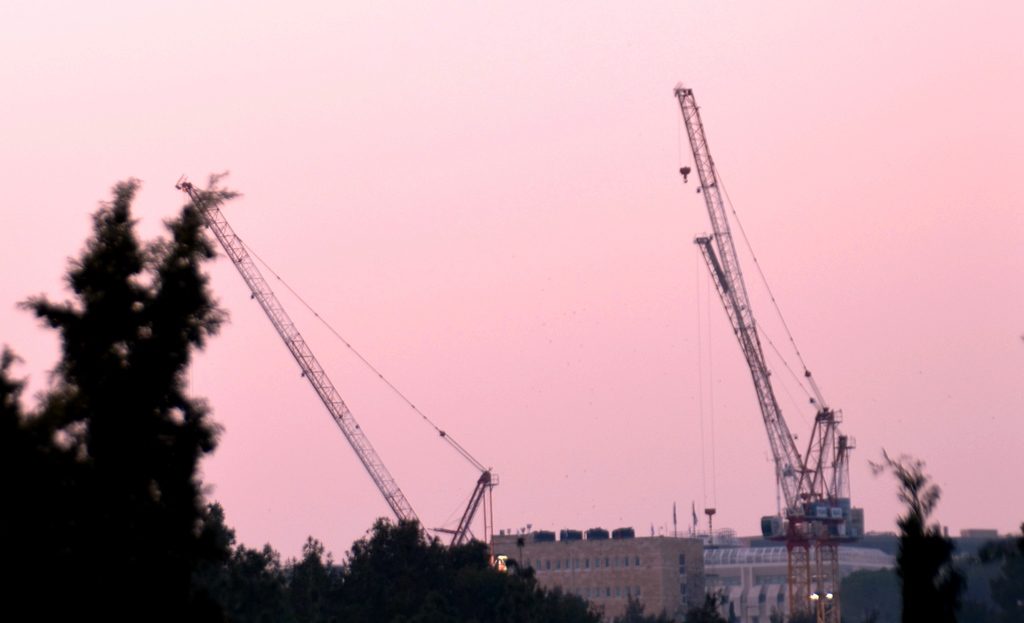 Building cranes moving again after Passover and coronavirus stop 