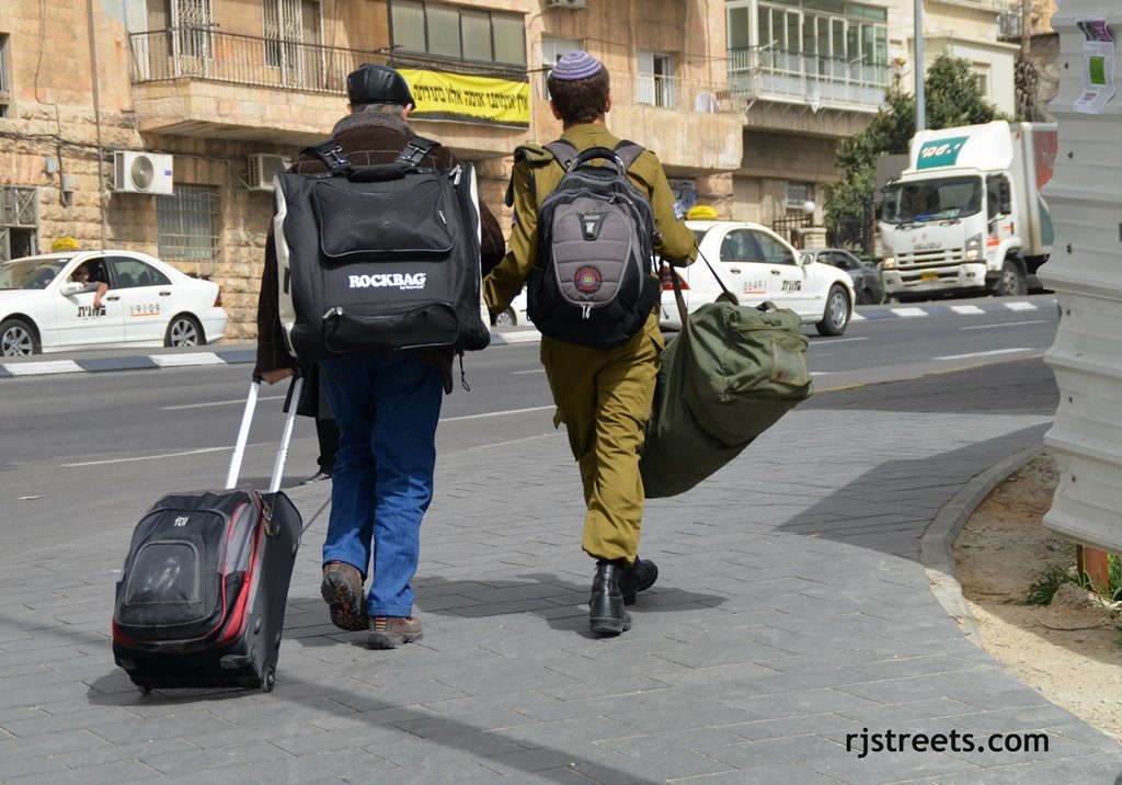 Blind man and IDF soldier who helped him across busy intersection in Jerusalem