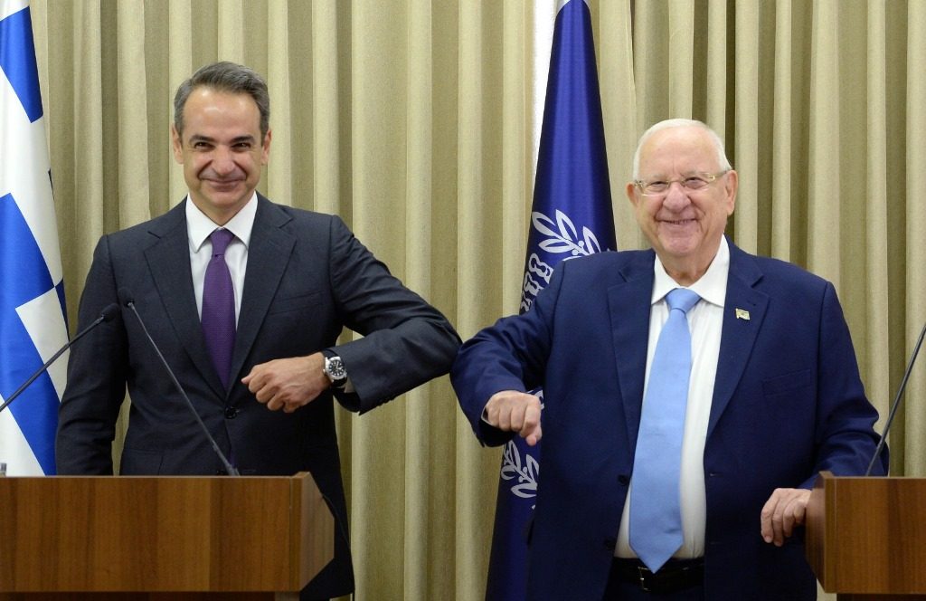 Prime Minister Kyriakos Mitsotakis of Greece:and Israeli President at Beit Hanasi bump elbows 