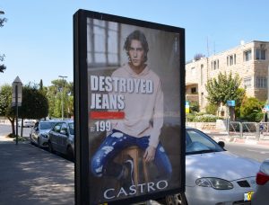 Destroyed Jeans sign in Jerusalem Israel